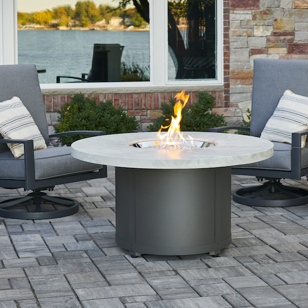 The Outdoor GreatRoom Company White Onyx Beacon Round Gas Fire Pit Table - ships as a Propane Fire Pit and comes with a Natural Gas Conversion Kit (if needed)