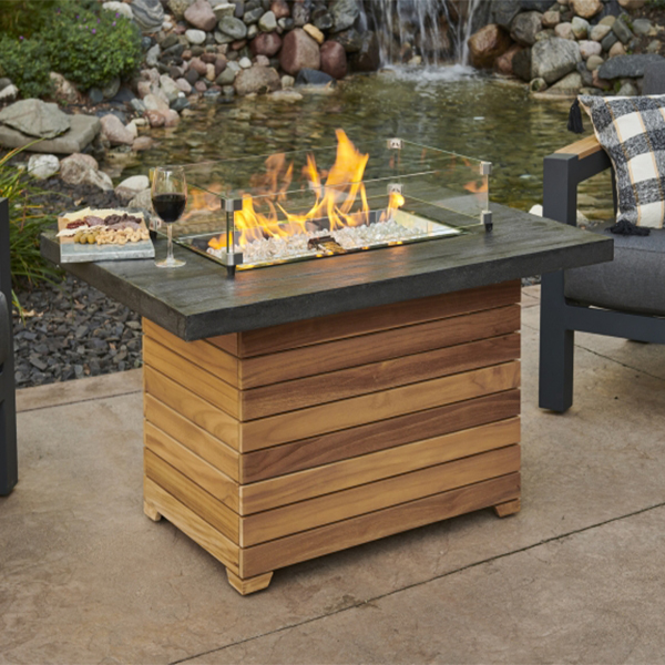 The Outdoor GreatRoom Company Darien Rectangular Gas Fire Pit Table with Everblend Top - ships as a Propane Fire Pit and comes with a Natural Gas Conversion Kit (if needed)