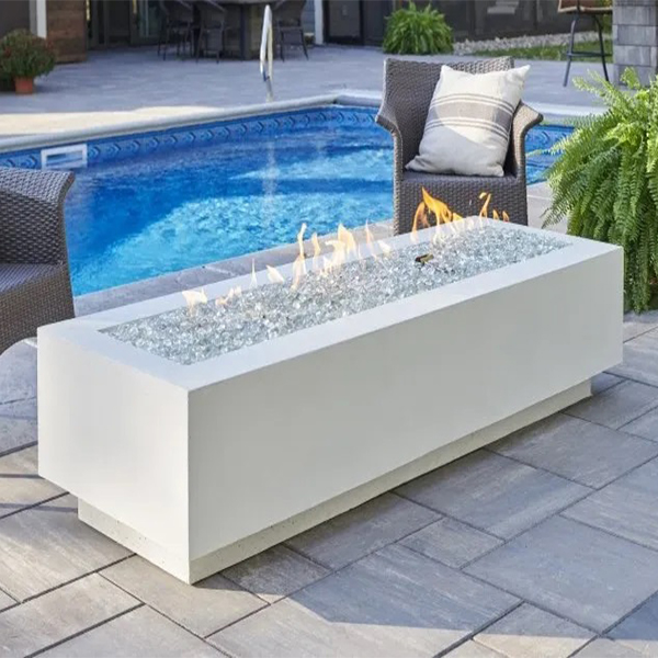 The Outdoor GreatRoom Company White Cove 54&quot; Linear Gas Fire Table - ships as a Propane Fire Pit and comes with a Natural Gas Conversion Kit (if needed)
